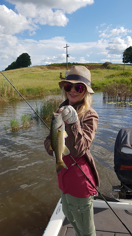 Linky with a bass caught at Mearns Dam