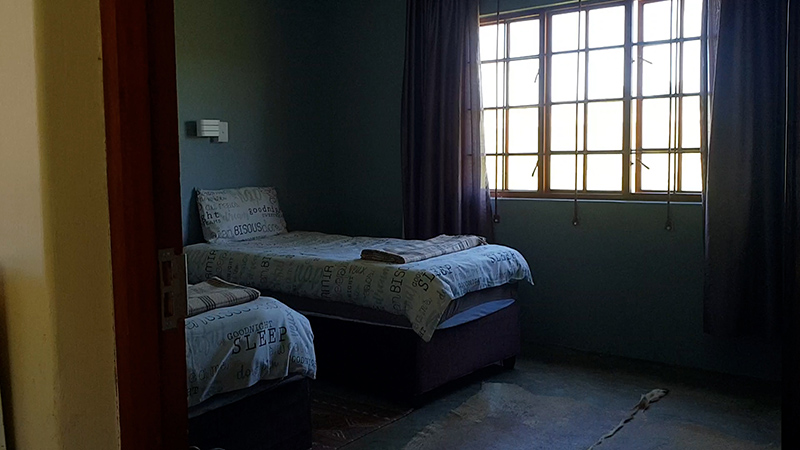 A bedroom at the cottage at Fountain Hall Guest Farm