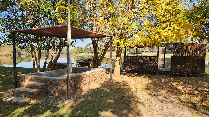 The lapa and braai area by the water at Aqua Diqua