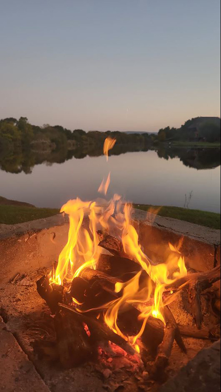 Night fishing by the fire at Aqua Diqua