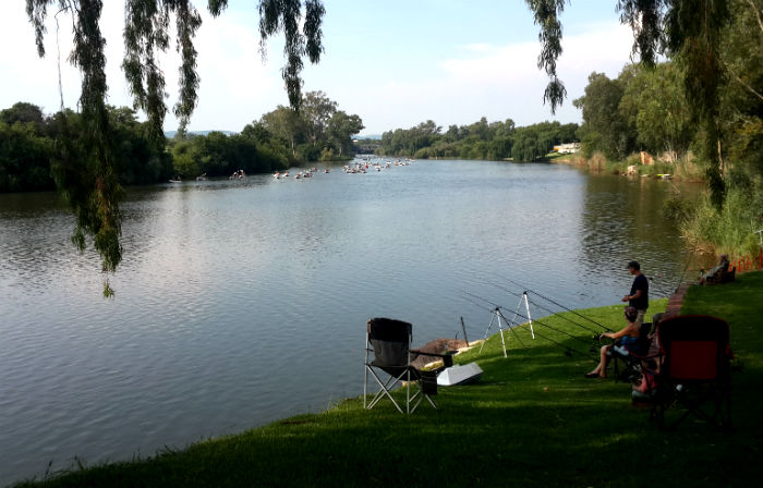 Fishing area at La Retraite with rafters approaching